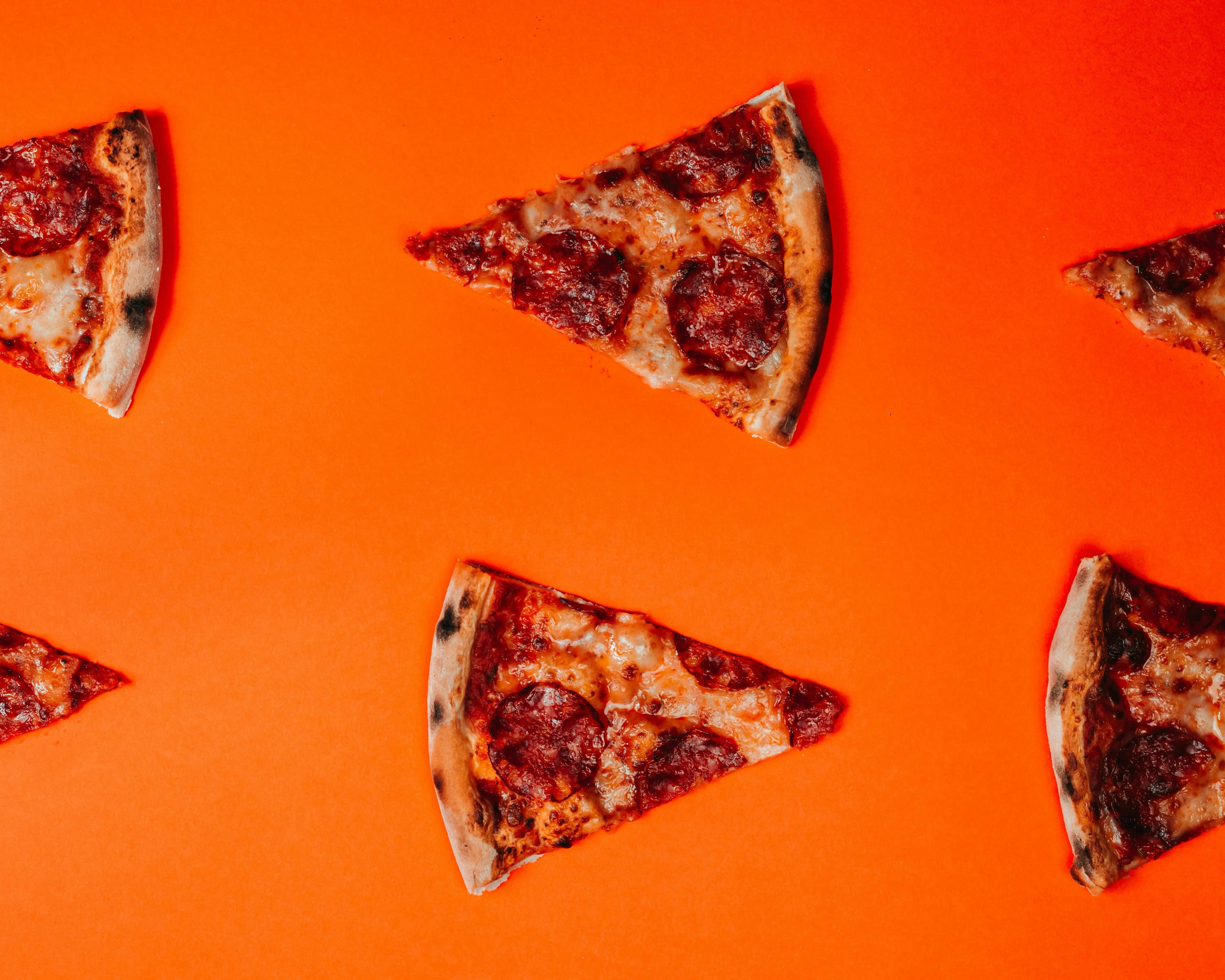 Photo of several slices of pizza