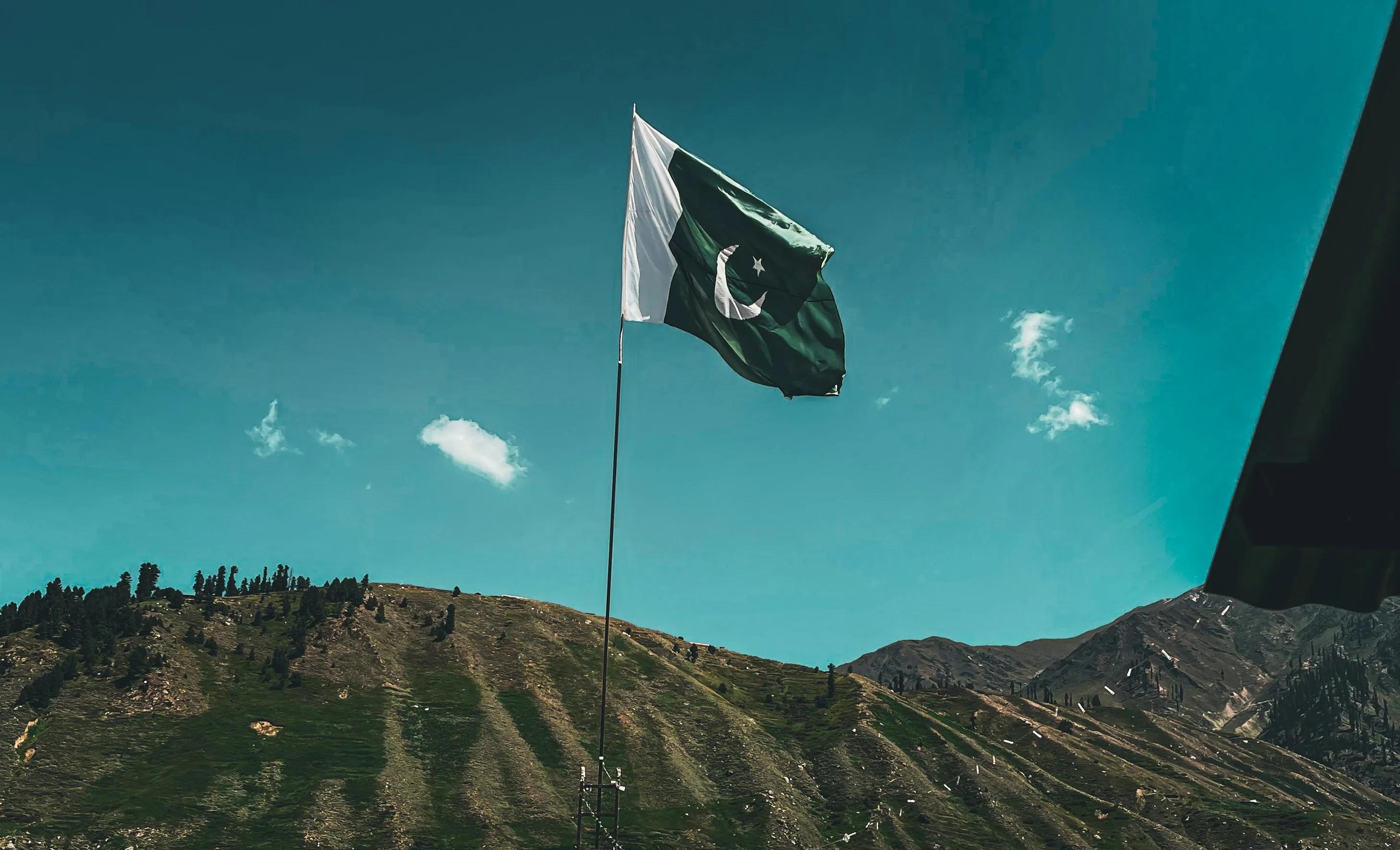 Pakistani flag flies in the mountains