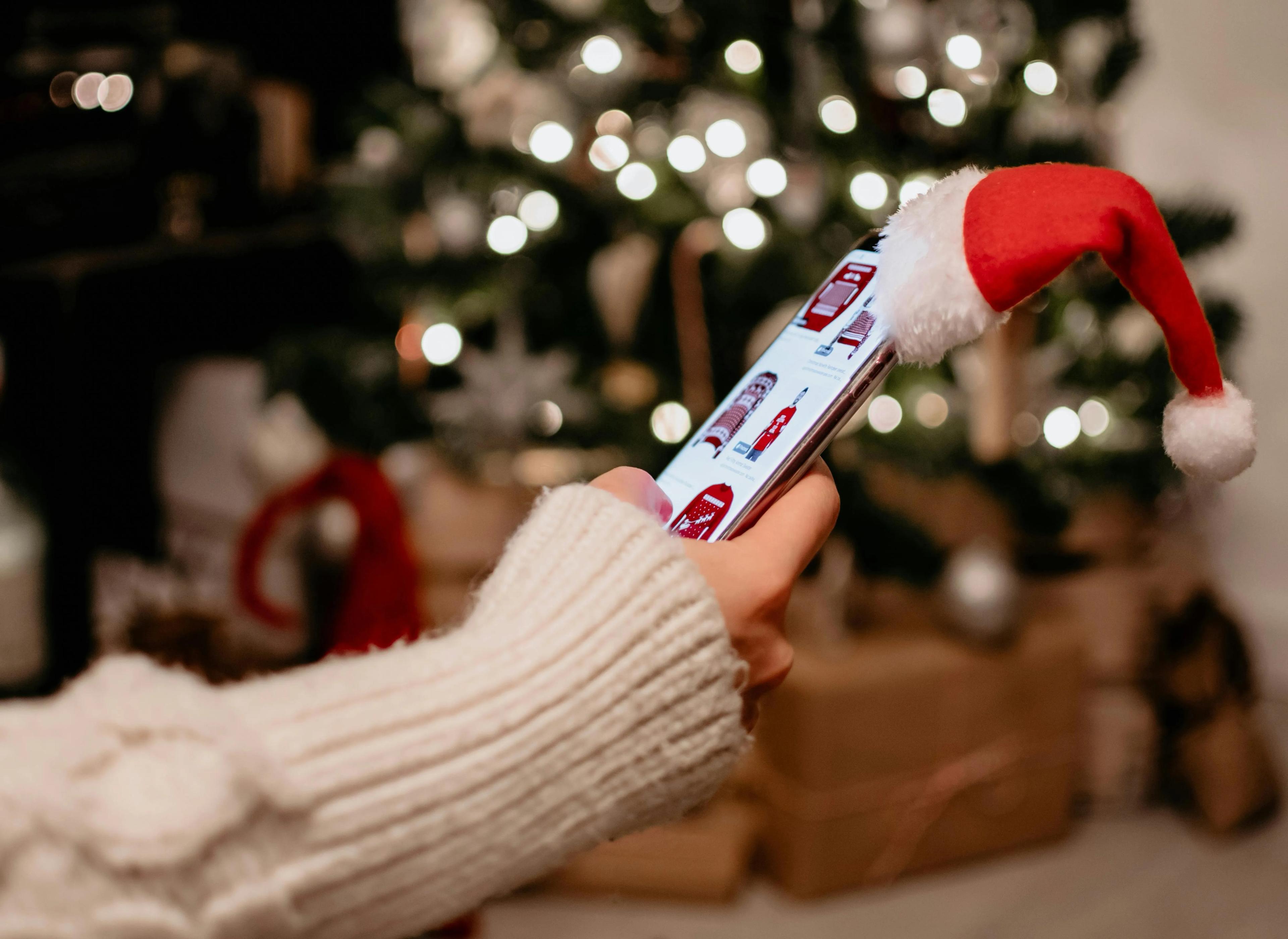 Phone with a santa hat on