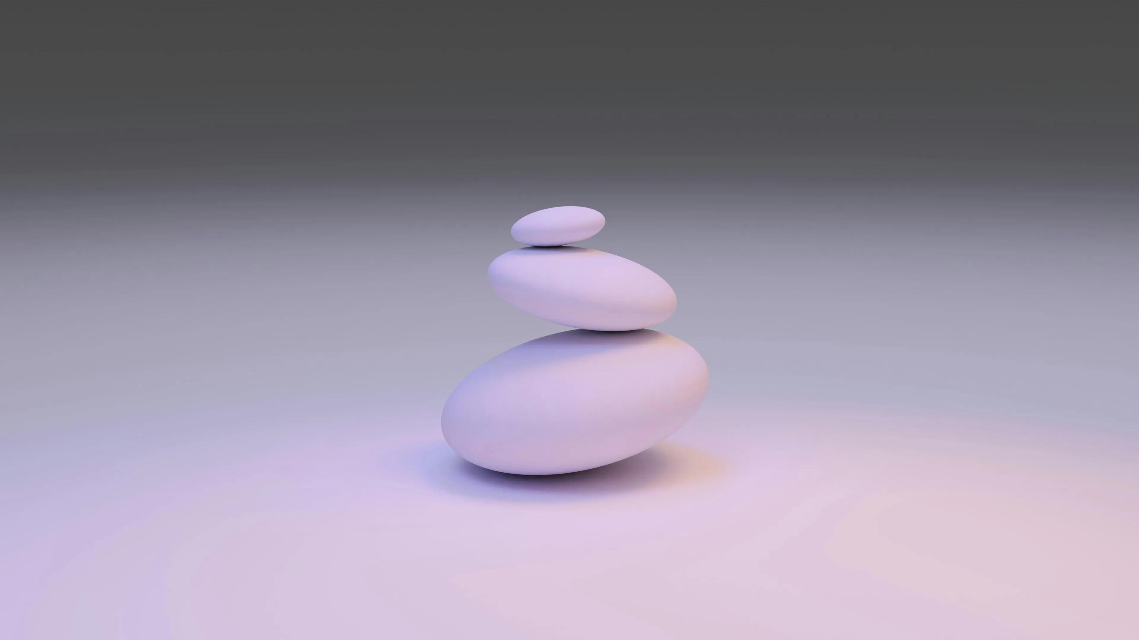 three rocks balancing to represent the difficulty in balancing the important factors of blockchain