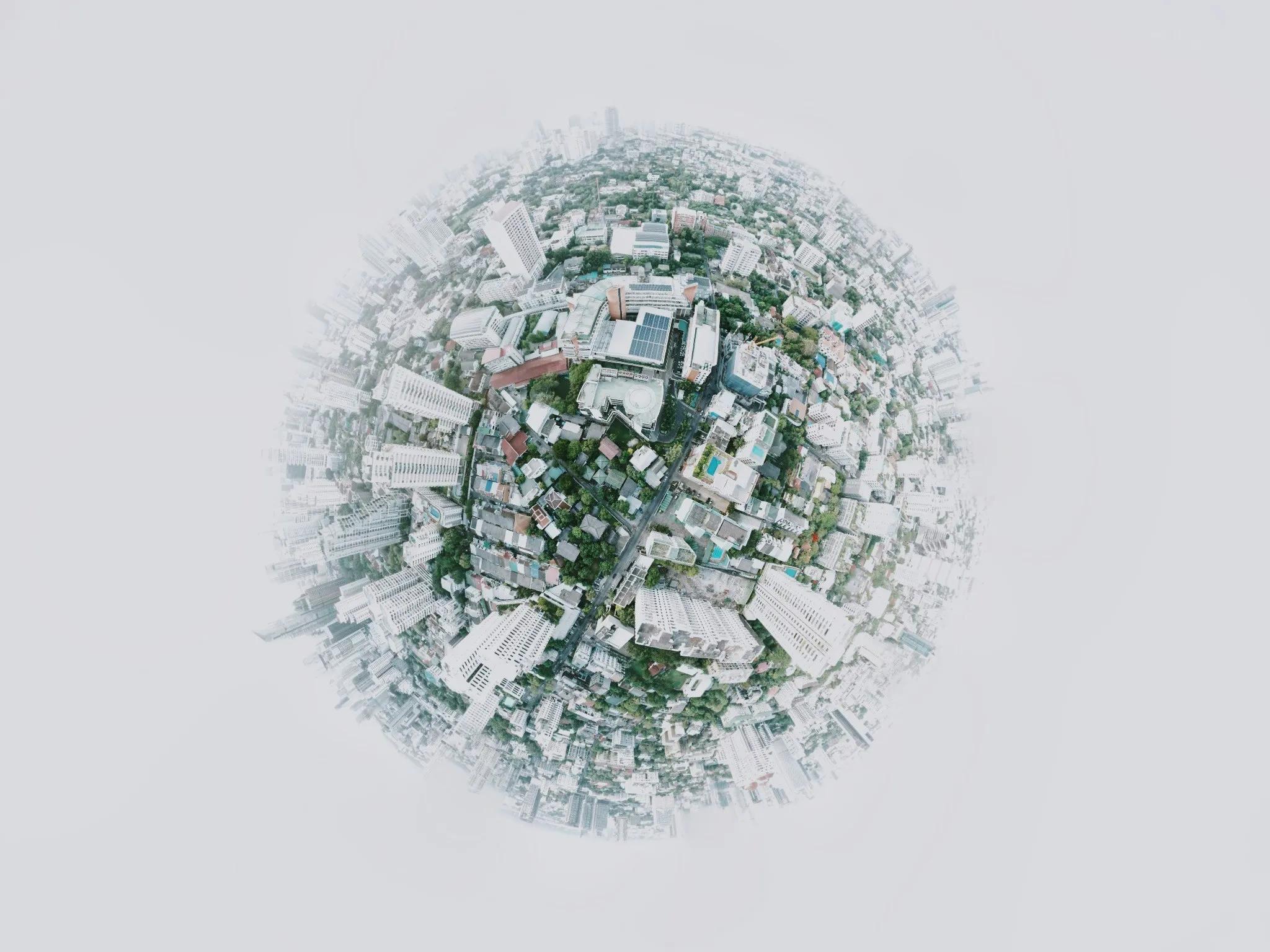 A drone photo of the earth from above, appearing as a globe